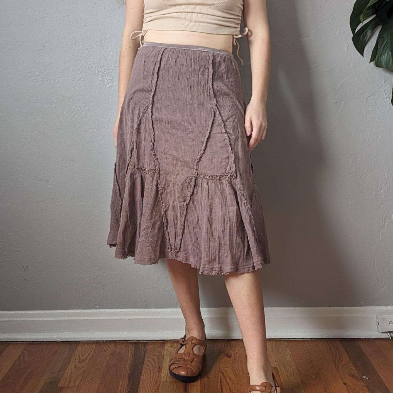 flowy midi skirt. the color is light brown and it... - Depop