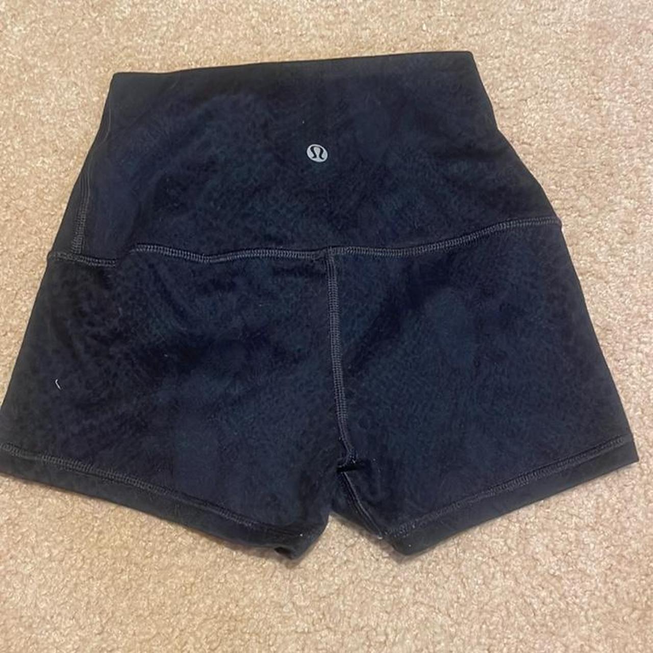 Lululemon booty shorts, black with a snake print... - Depop