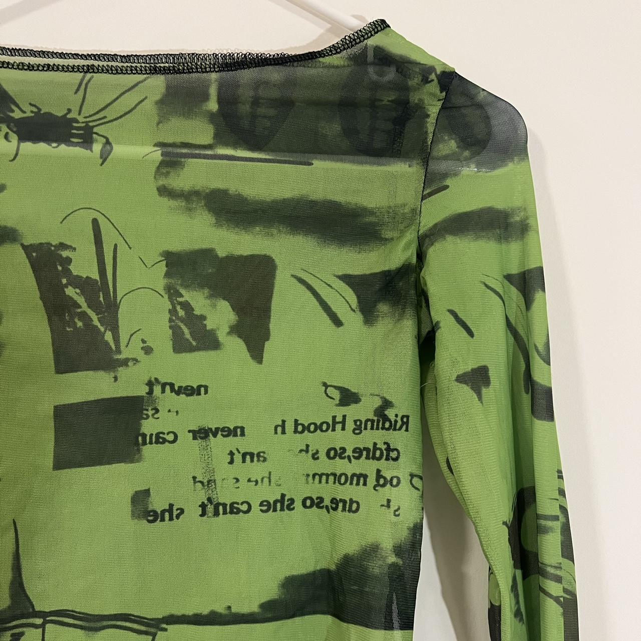 Cropped Green mesh long sleeve top with black print... Depop