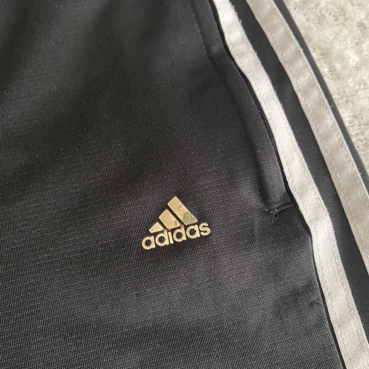 Vintage retro adidas trackies in size 8 with stripes... - Depop