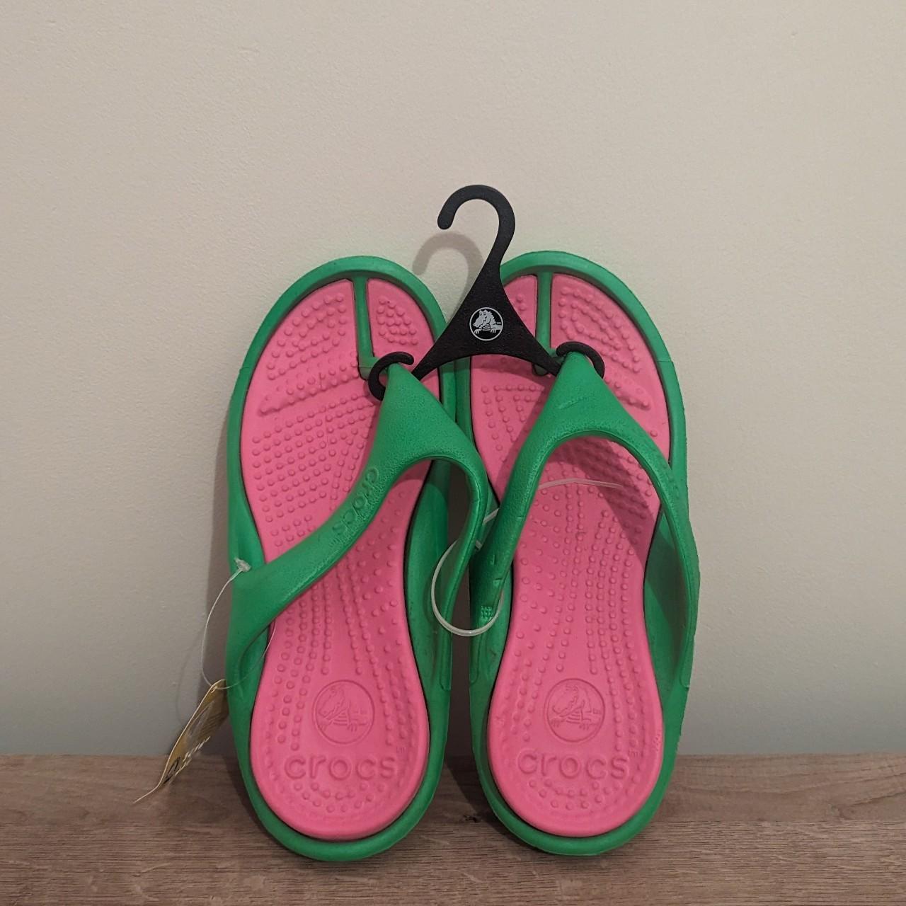 Pink and green croc flipflops. Slight wedge. Brand