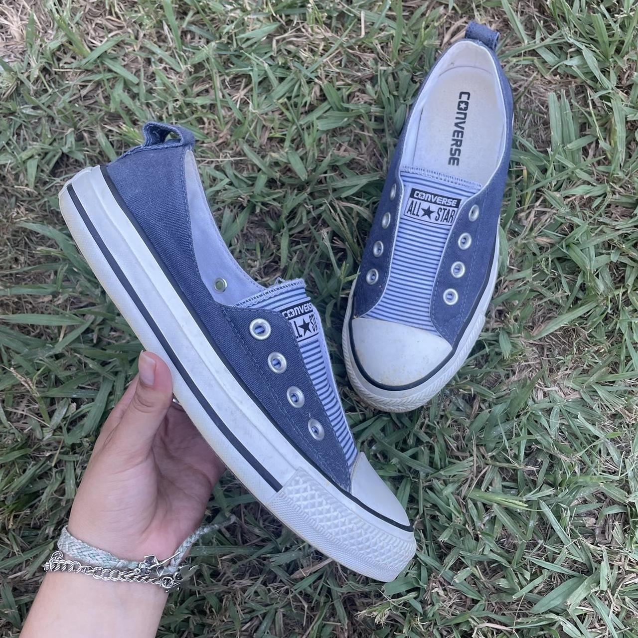 Navy blue deals slip on converse