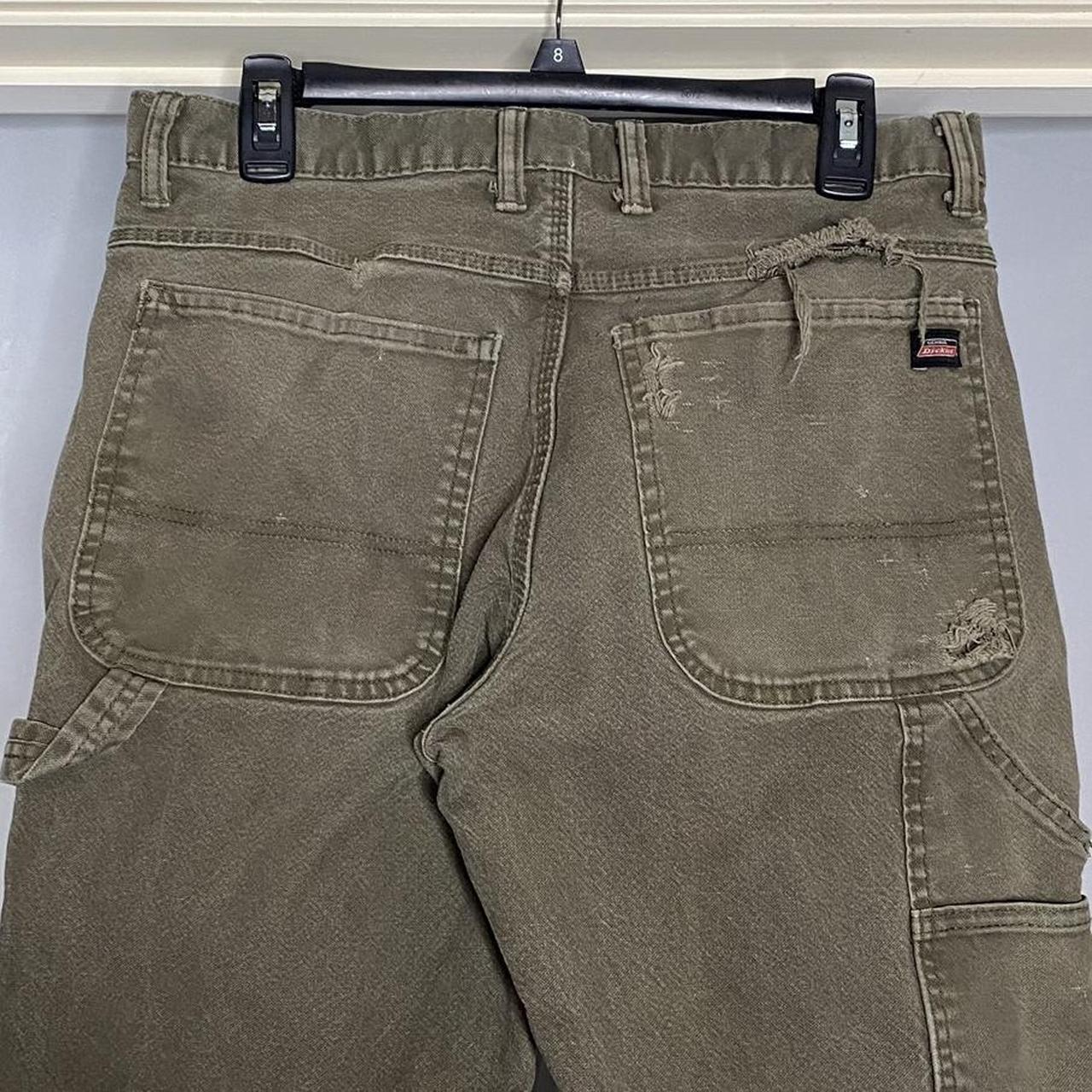 Khaki dickies carpenter pants. Has holes as seen in... - Depop