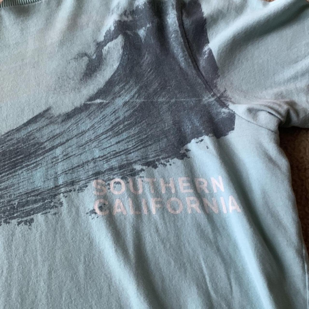 This is a large vintage light blue hollister t - Depop