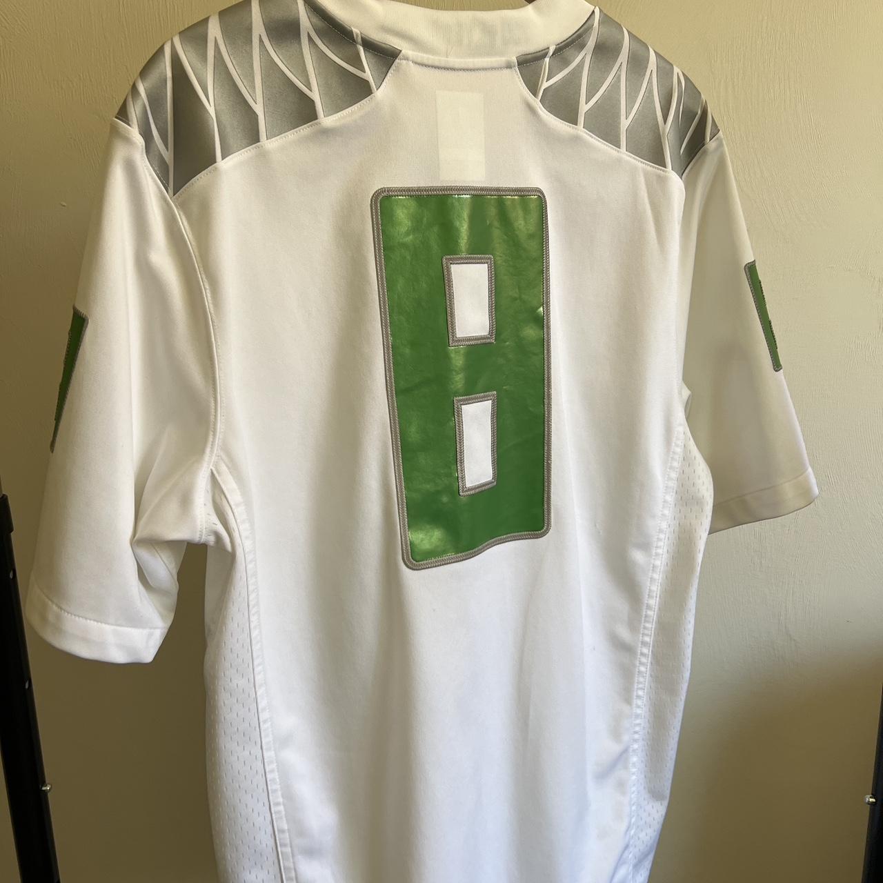 Marcus Mariota Oregon Ducks jersey. Stitched youth - Depop