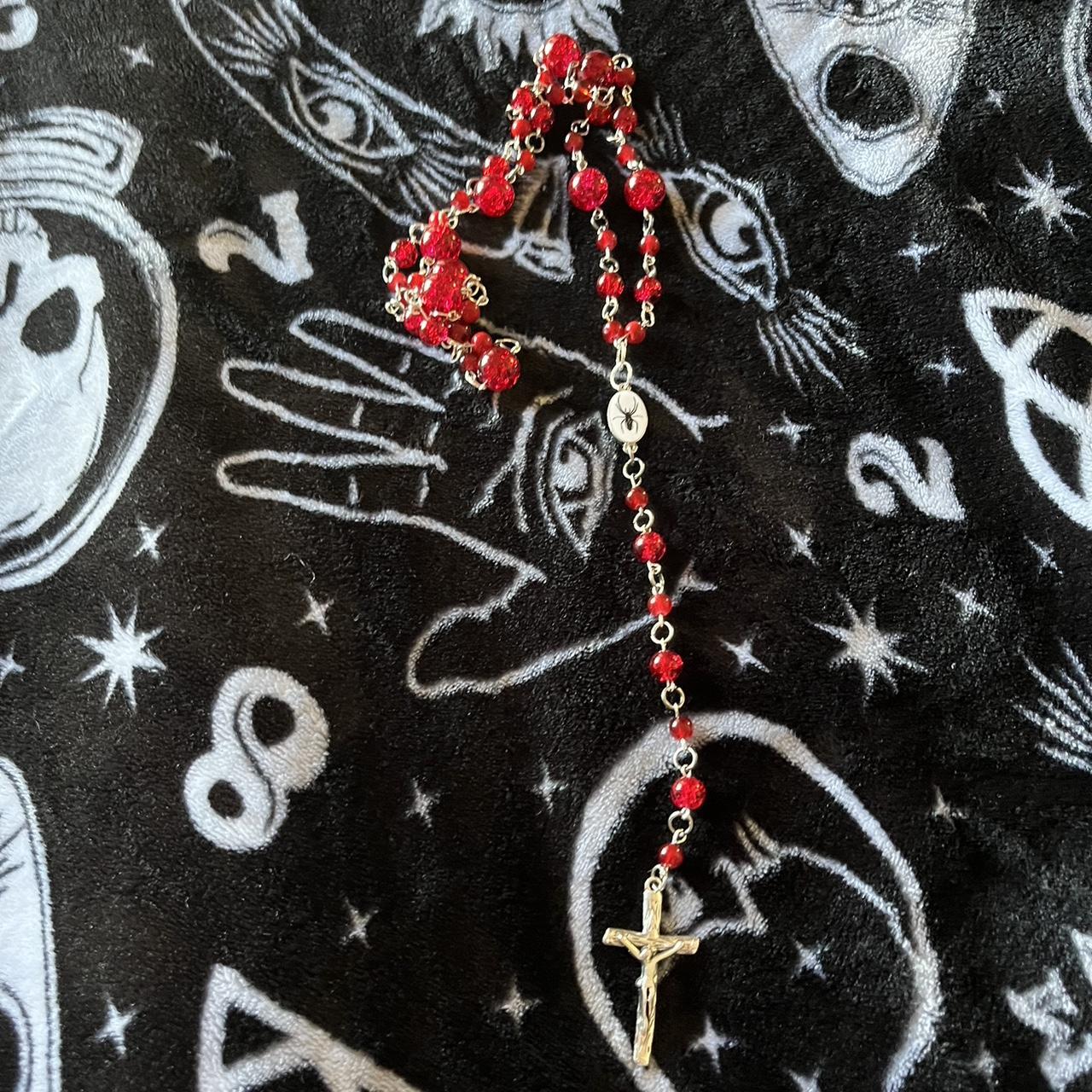 Red spider charm rosary style necklace. Made with a... Depop