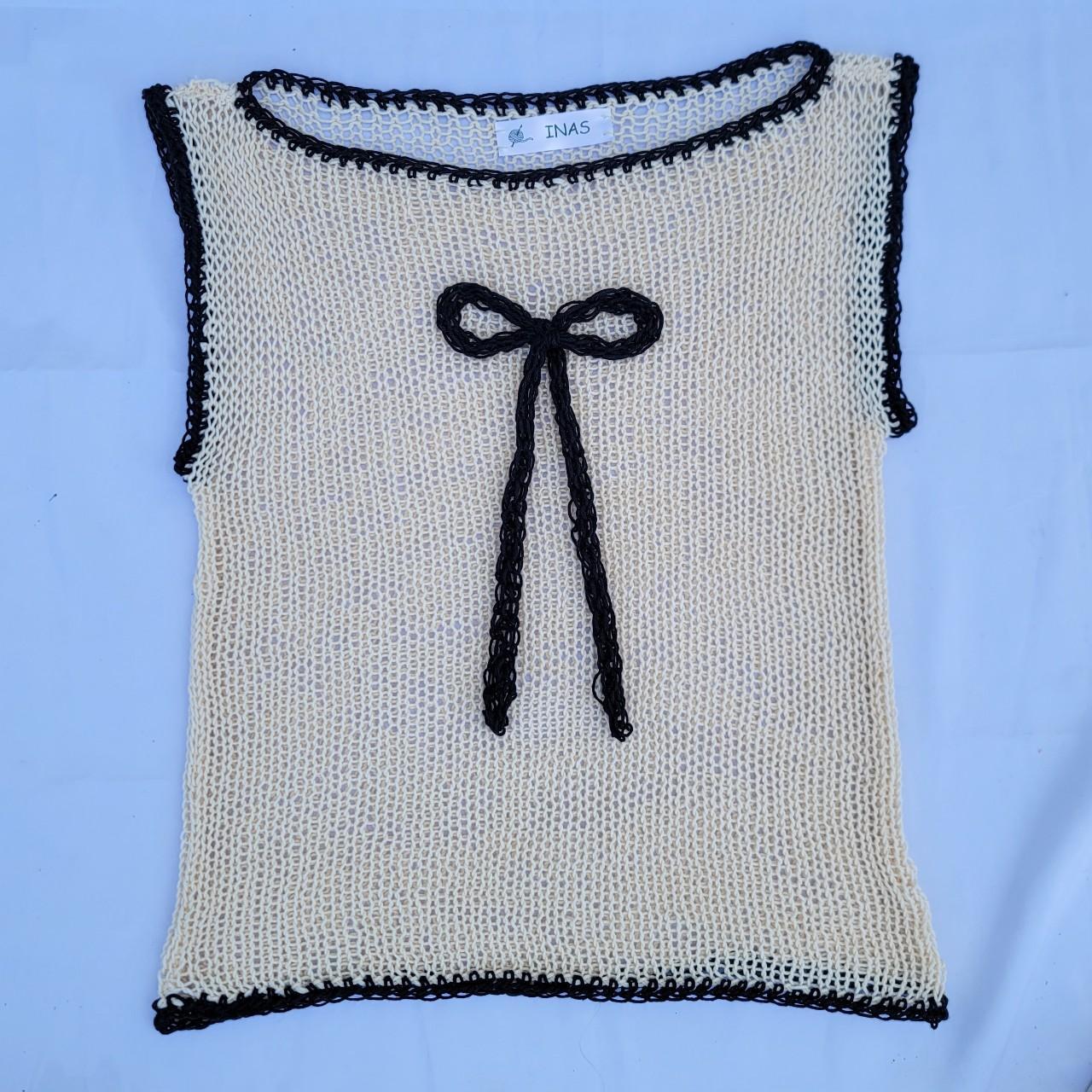 Knitted top with black bow and black details... - Depop