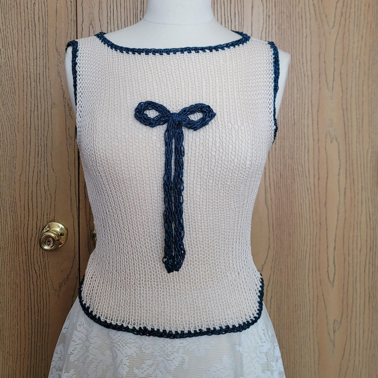 Knitted top with black bow and black details... - Depop