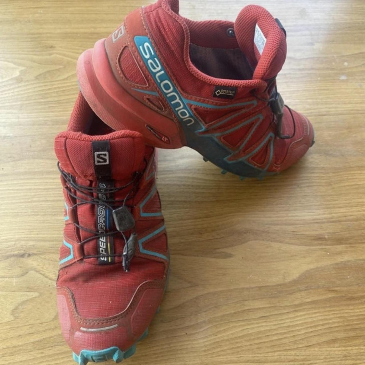 salomon red trainers