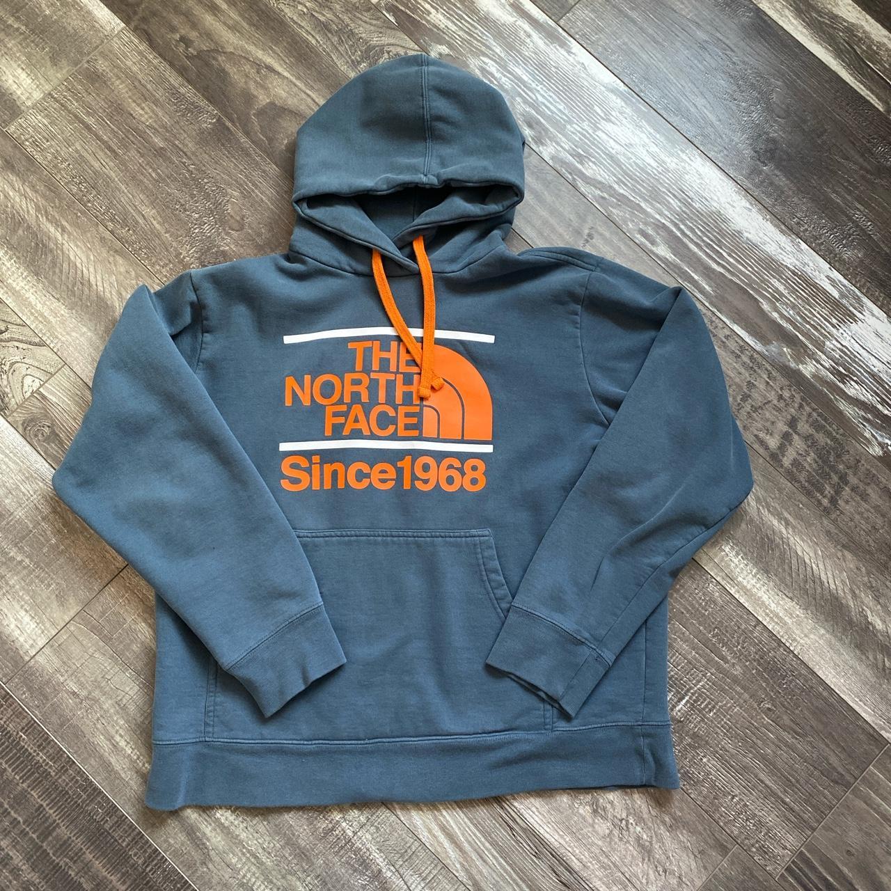 Orange north face online sweatshirt