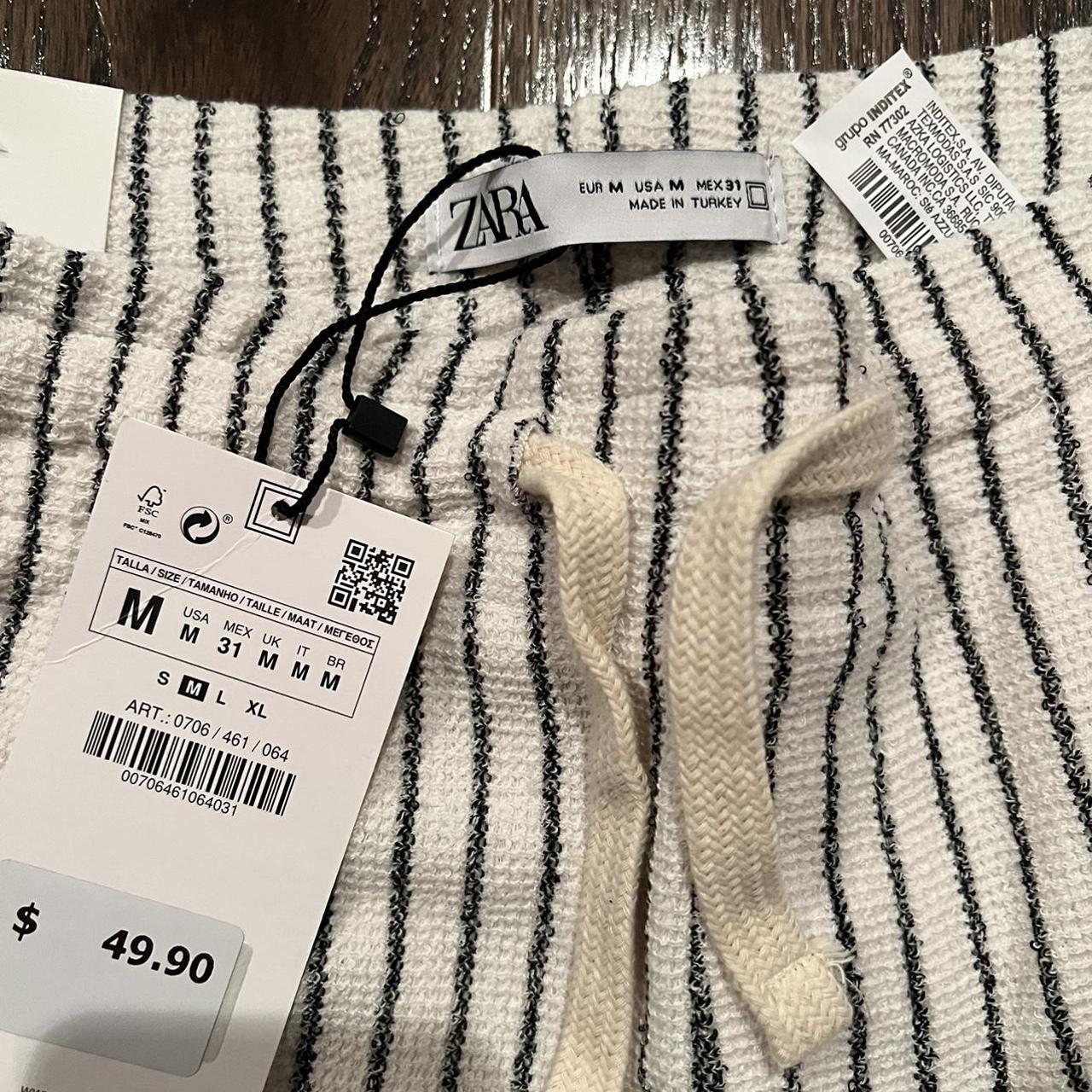 White Striped Zara Relaxed Fit pant Cloth material... Depop