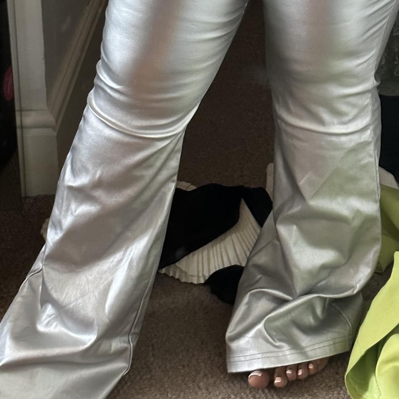 Silver metallic jeans/trousers. Not denim and very... - Depop