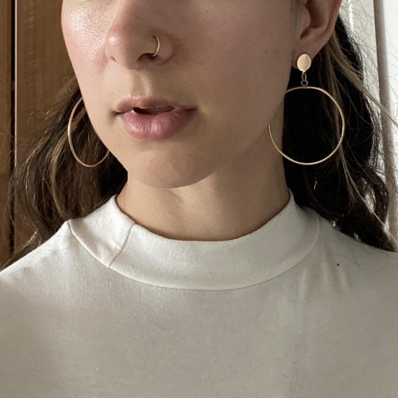 Gold hoops with a circular post I like how the hoops... - Depop