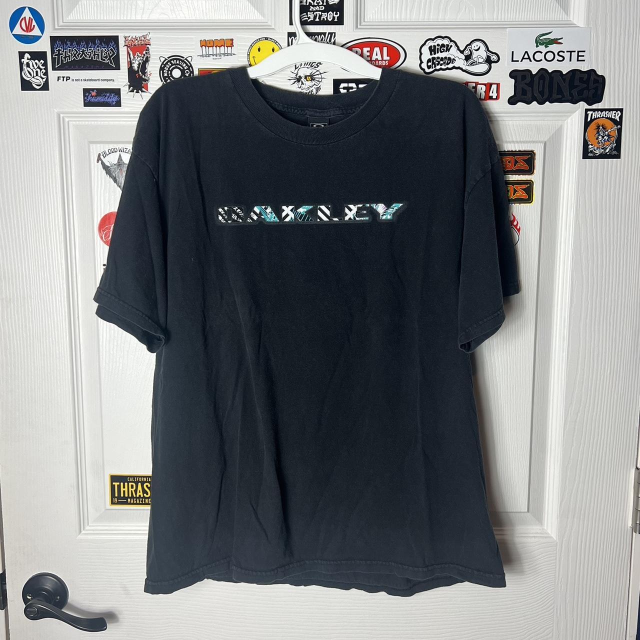 Oakley Men's Black and Blue T-shirt | Depop