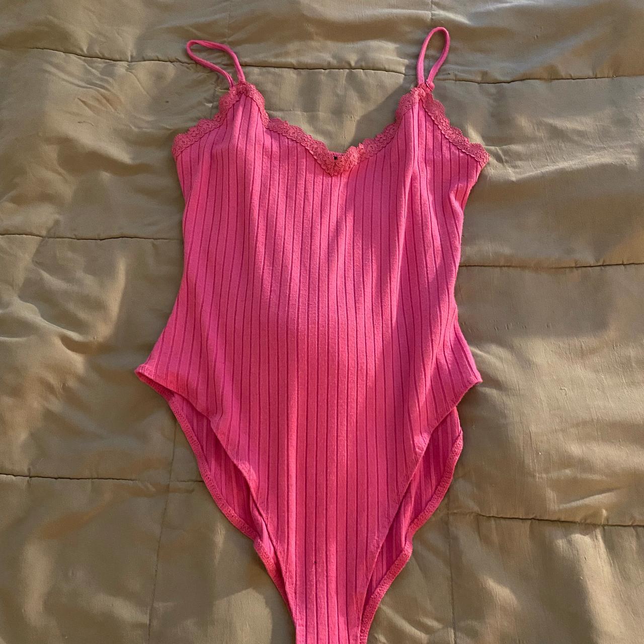 Pink lace bodysuit, size small - Depop