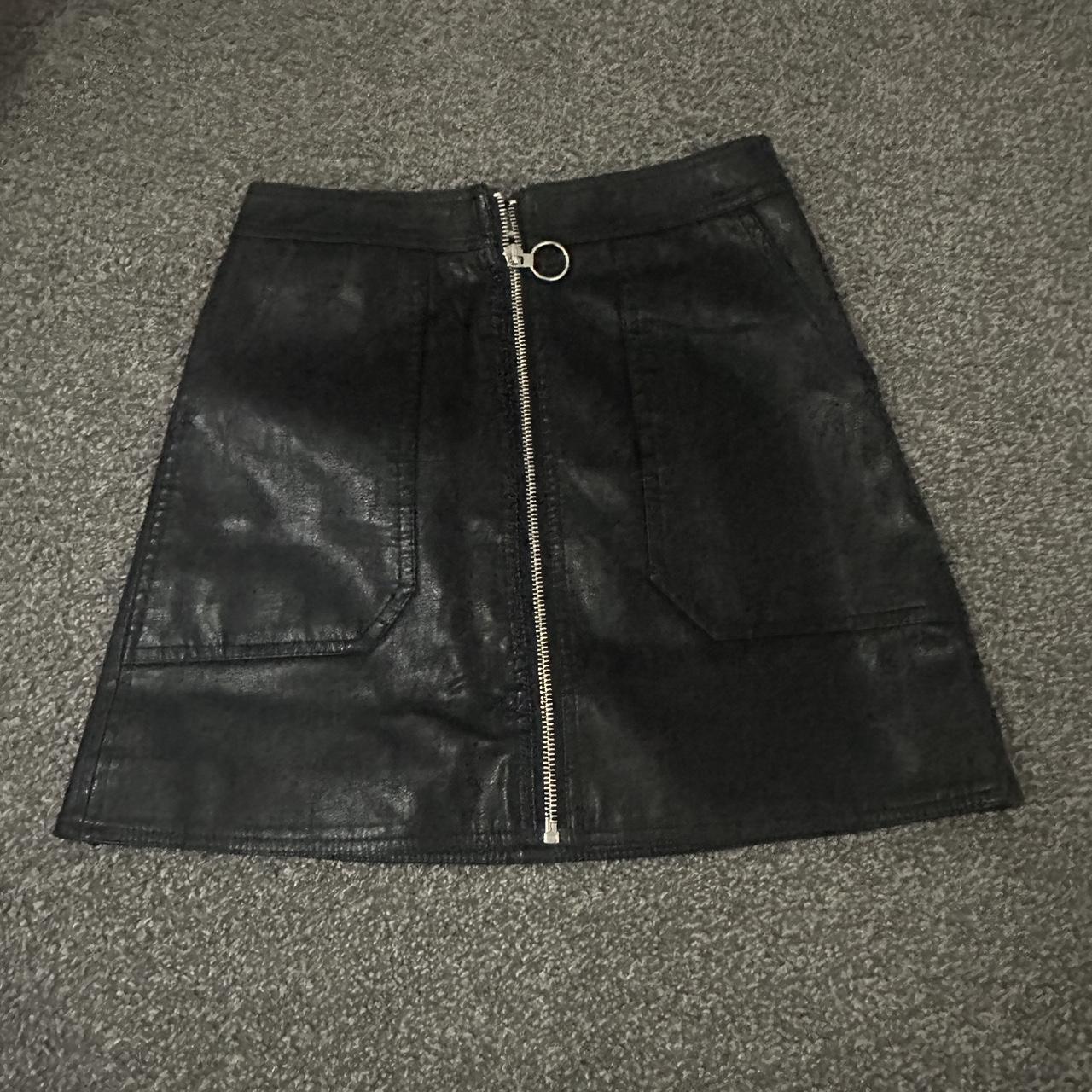 black leather skirt with zip in middle, size 6... - Depop