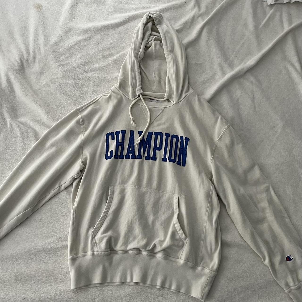 White champion hoodie with colored online letter