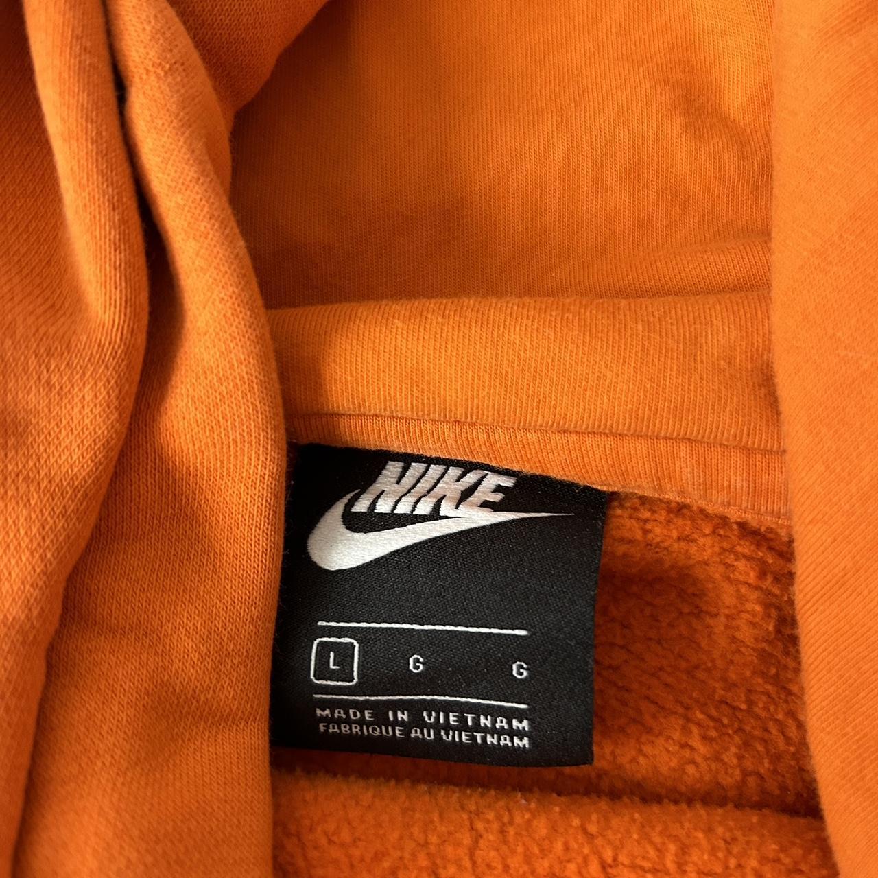 orange nike hoodie zip up
