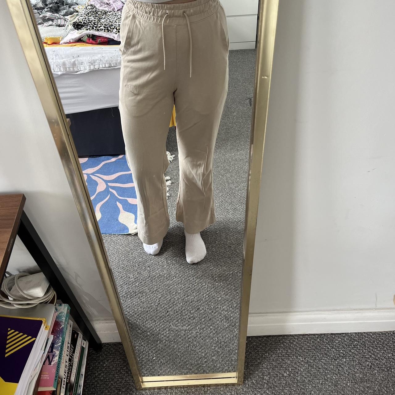 Nike swoosh oatmeal flared tracksuits. Beige hemp