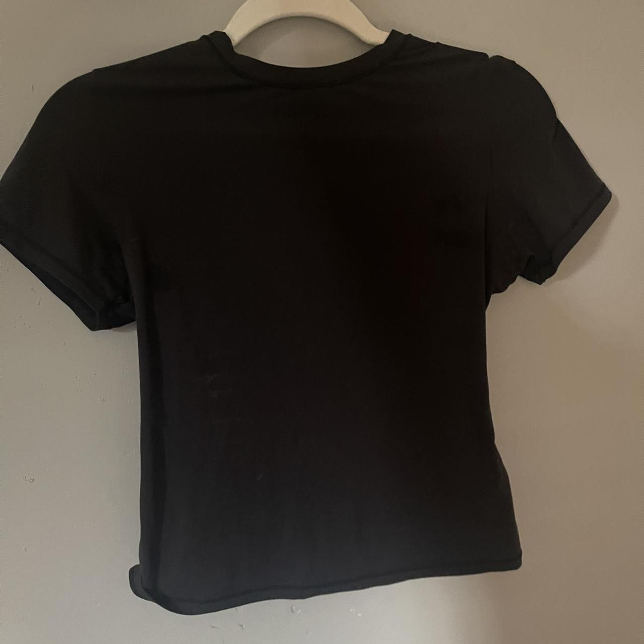 Skims Women's Black T-shirt | Depop