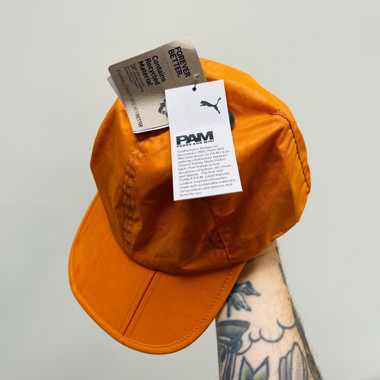 Orange on sale puma hat