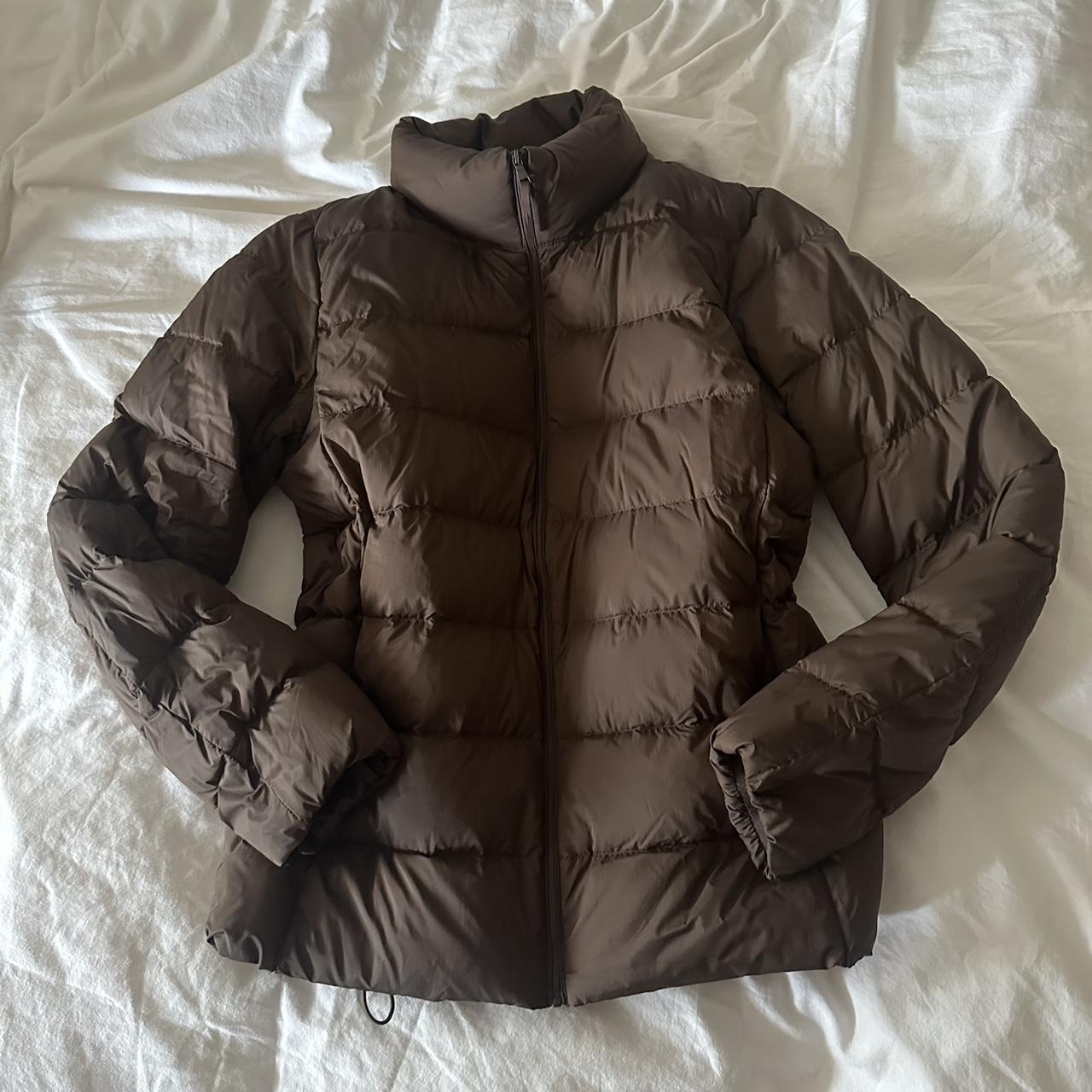 UNIQLO ultra light down brown jacket In great... - Depop