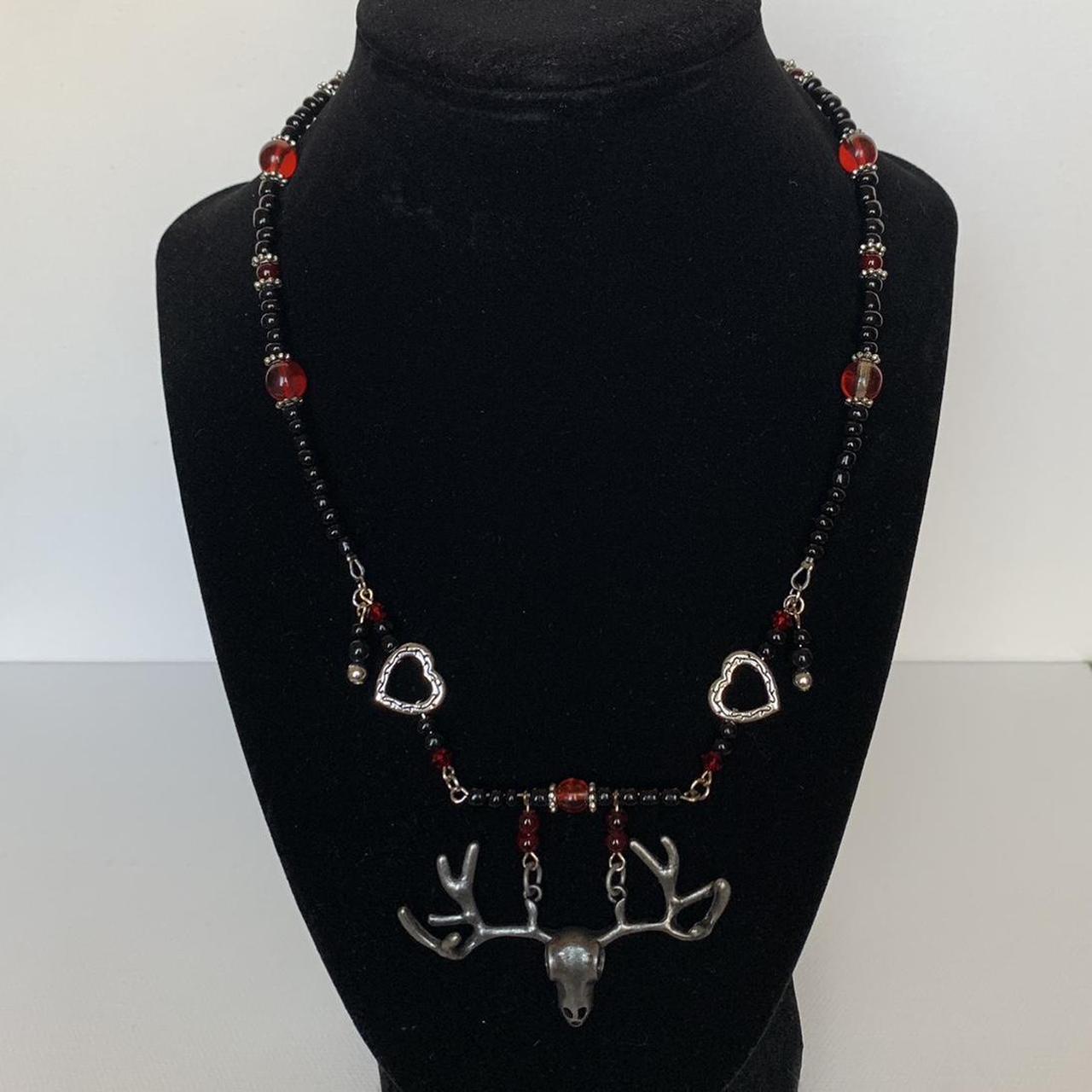 Handmade deer skull necklace made with black, red, - Depop