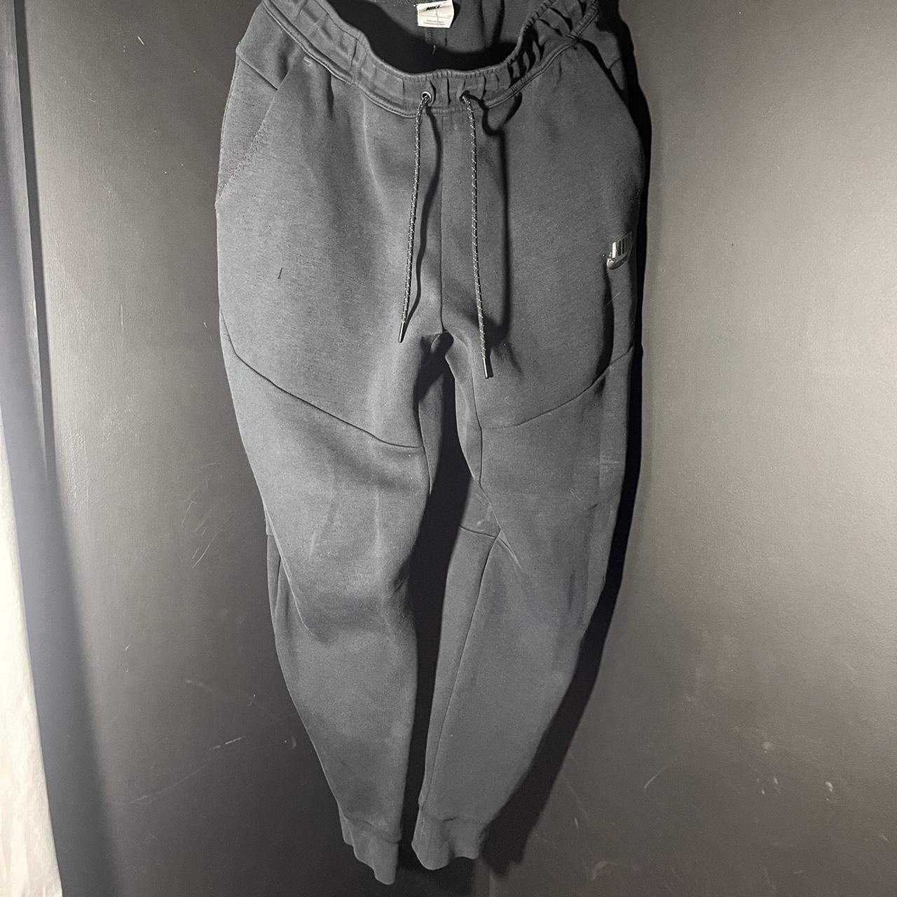 Small Black Nike Tech Fleece pants - Some visible... - Depop