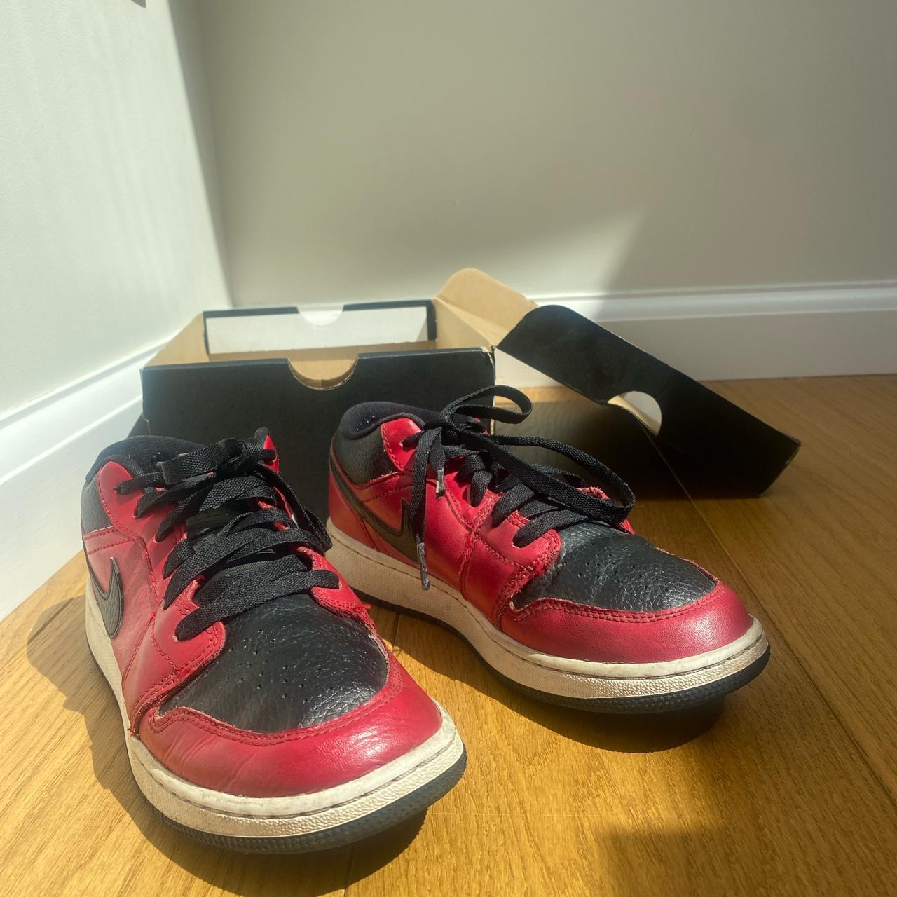 low top jordans black and red