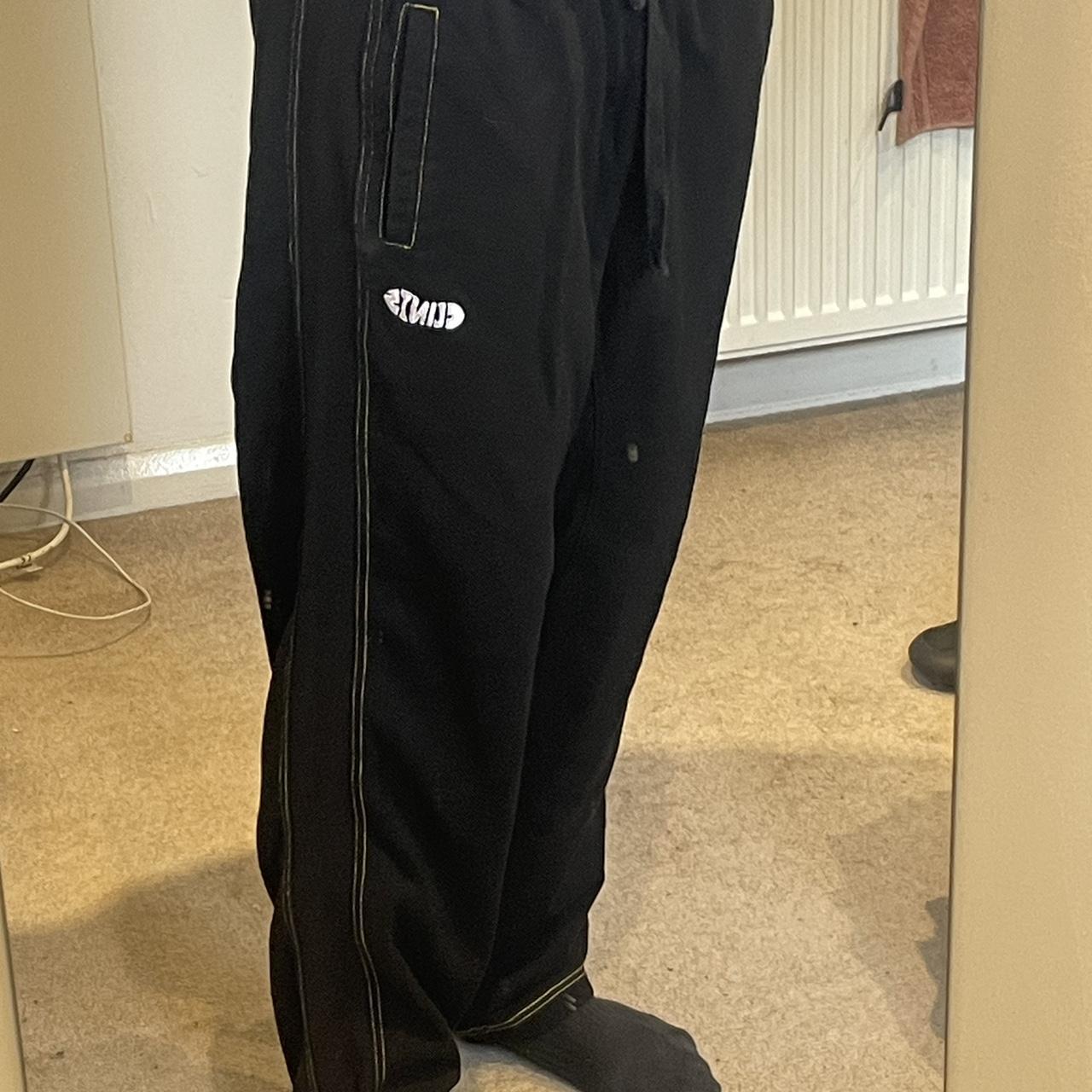 clint’s trackies tracksuit bottoms black with... - Depop