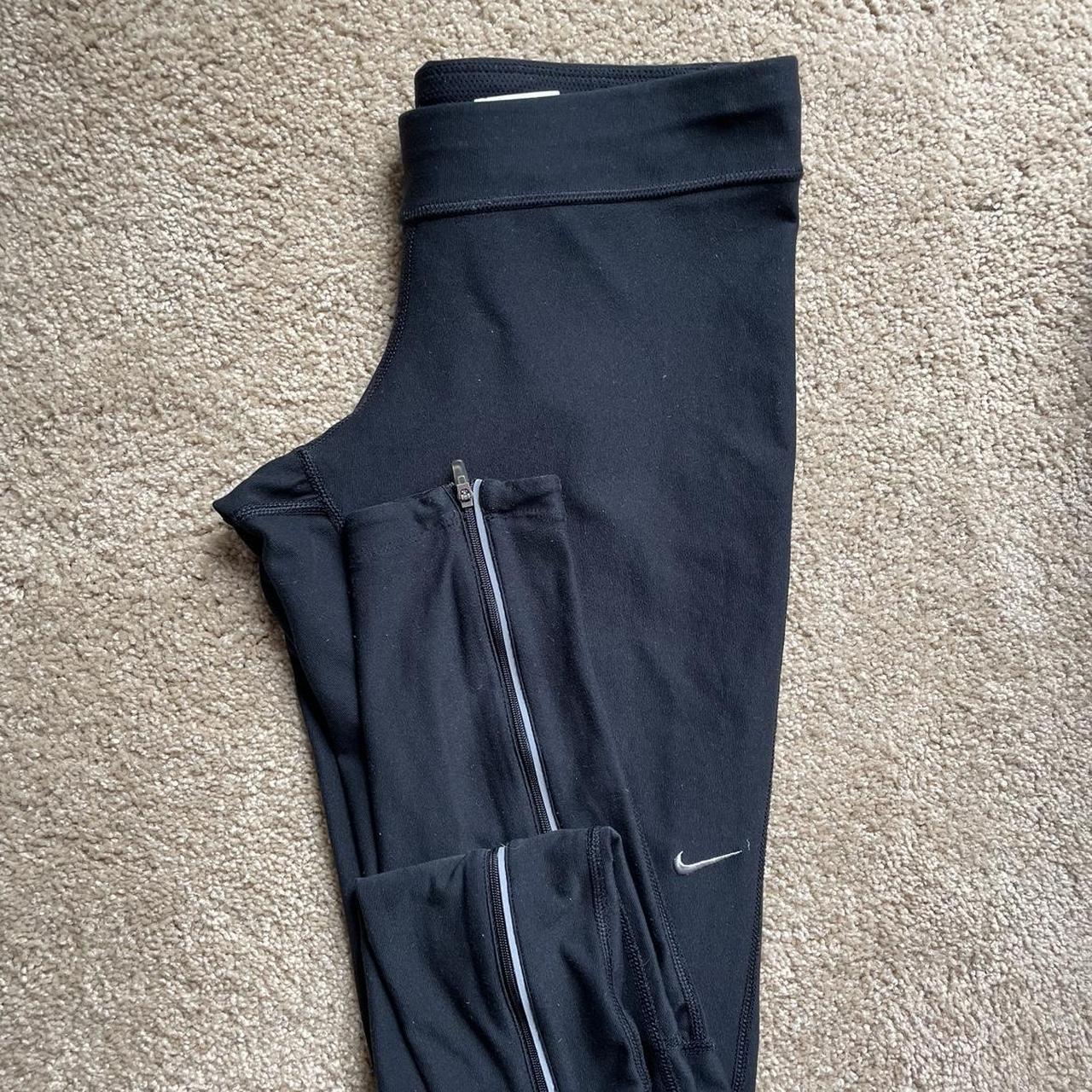 Nike running leggings size M Zippers up the back of. Depop