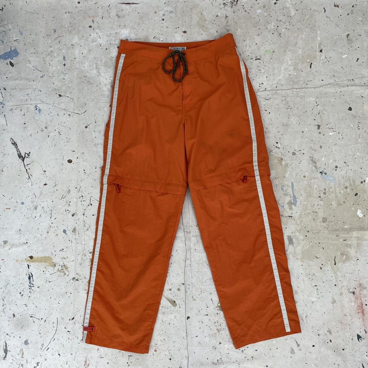 Orange store nylon pants