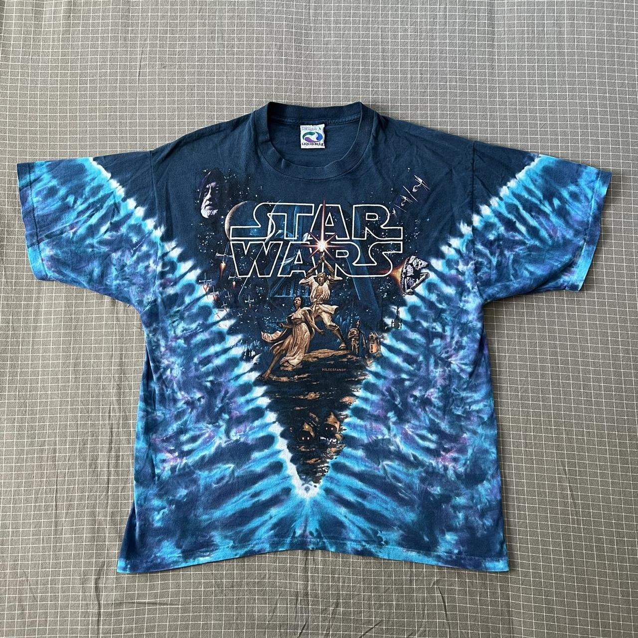 Vintage liquid blue tie dye Raiders T-shirt size - Depop