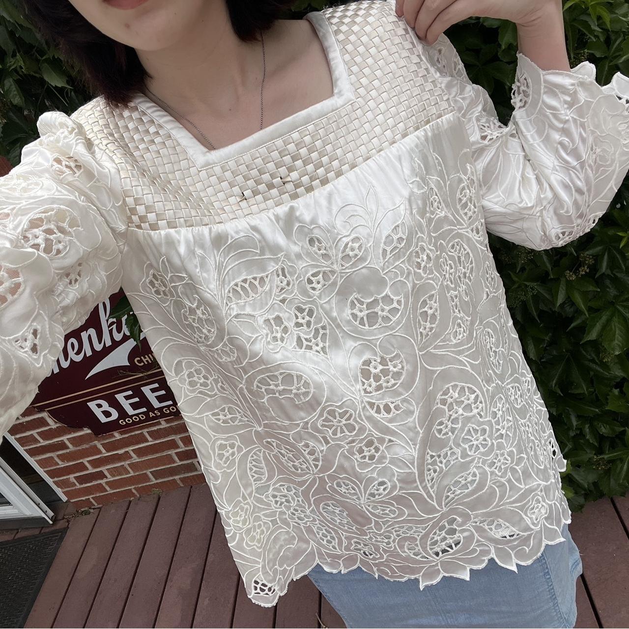 Cream colored blouse with ribbon weaving pattern.... Depop