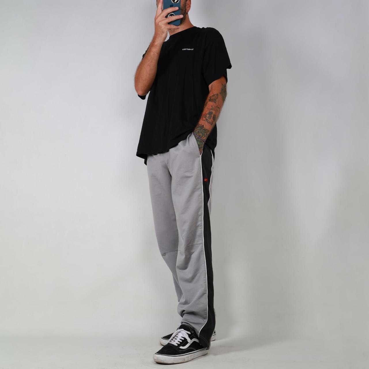 grey and black nike tracksuit