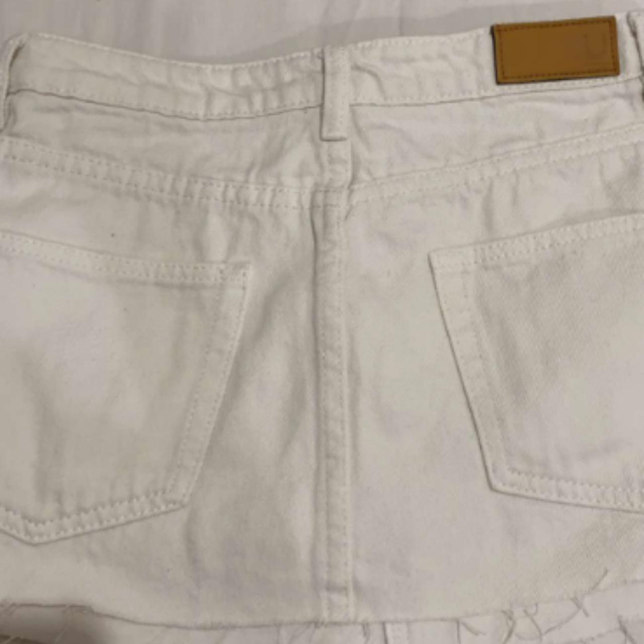 White denim mini skirt size xs selling for 50... - Depop