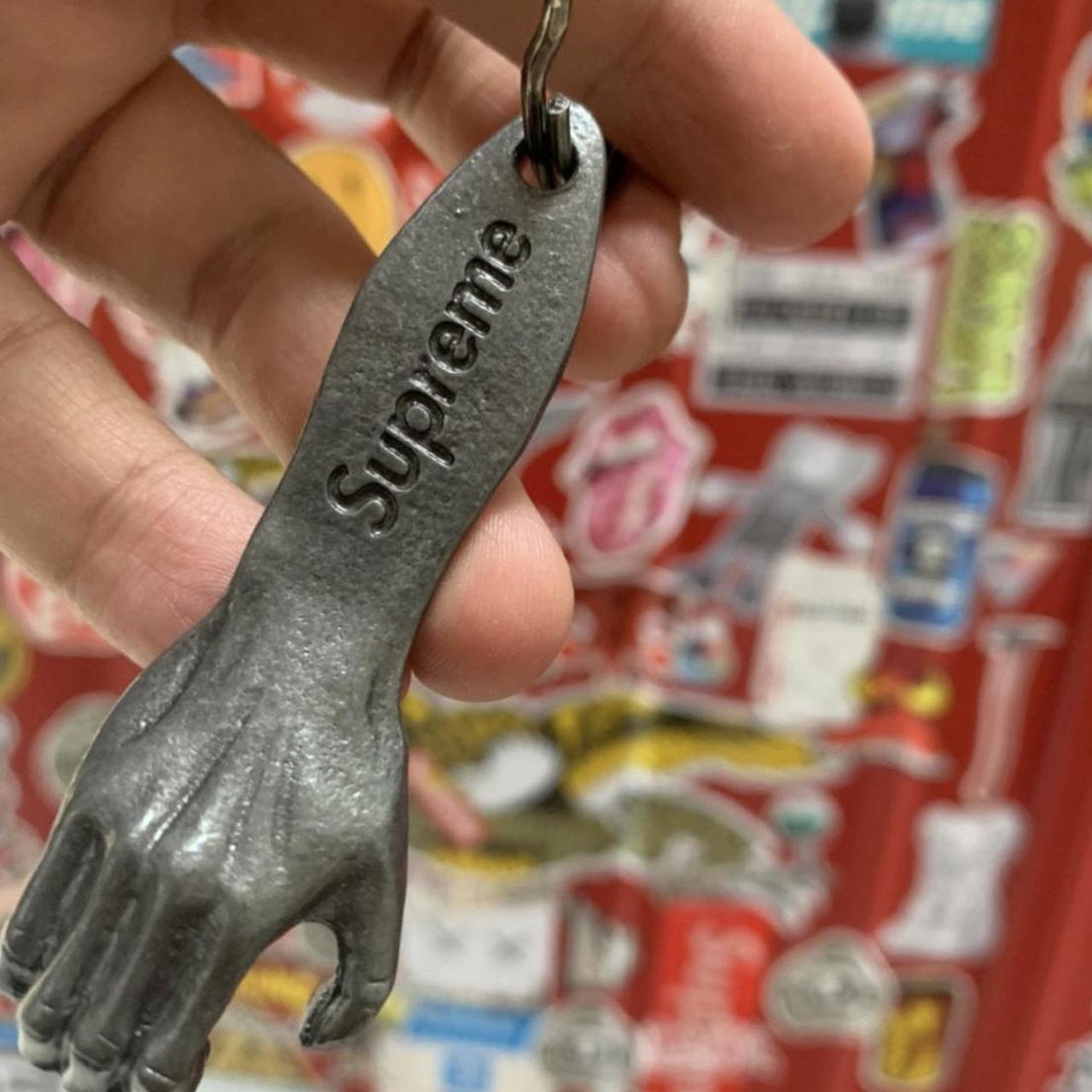Supreme Bottle Opener Webbing Keychain | Red | FARFETCH