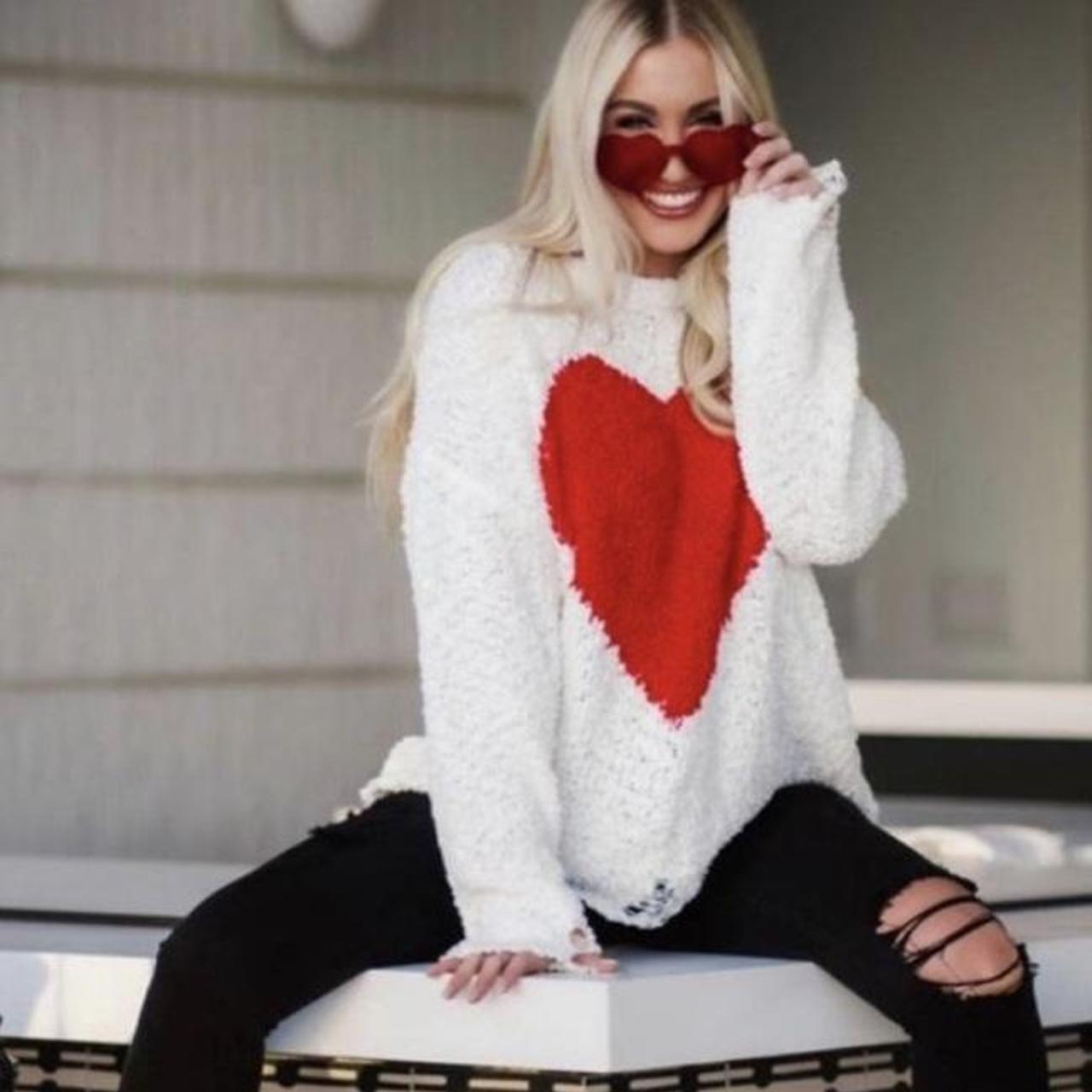 White jumper outlet with red hearts