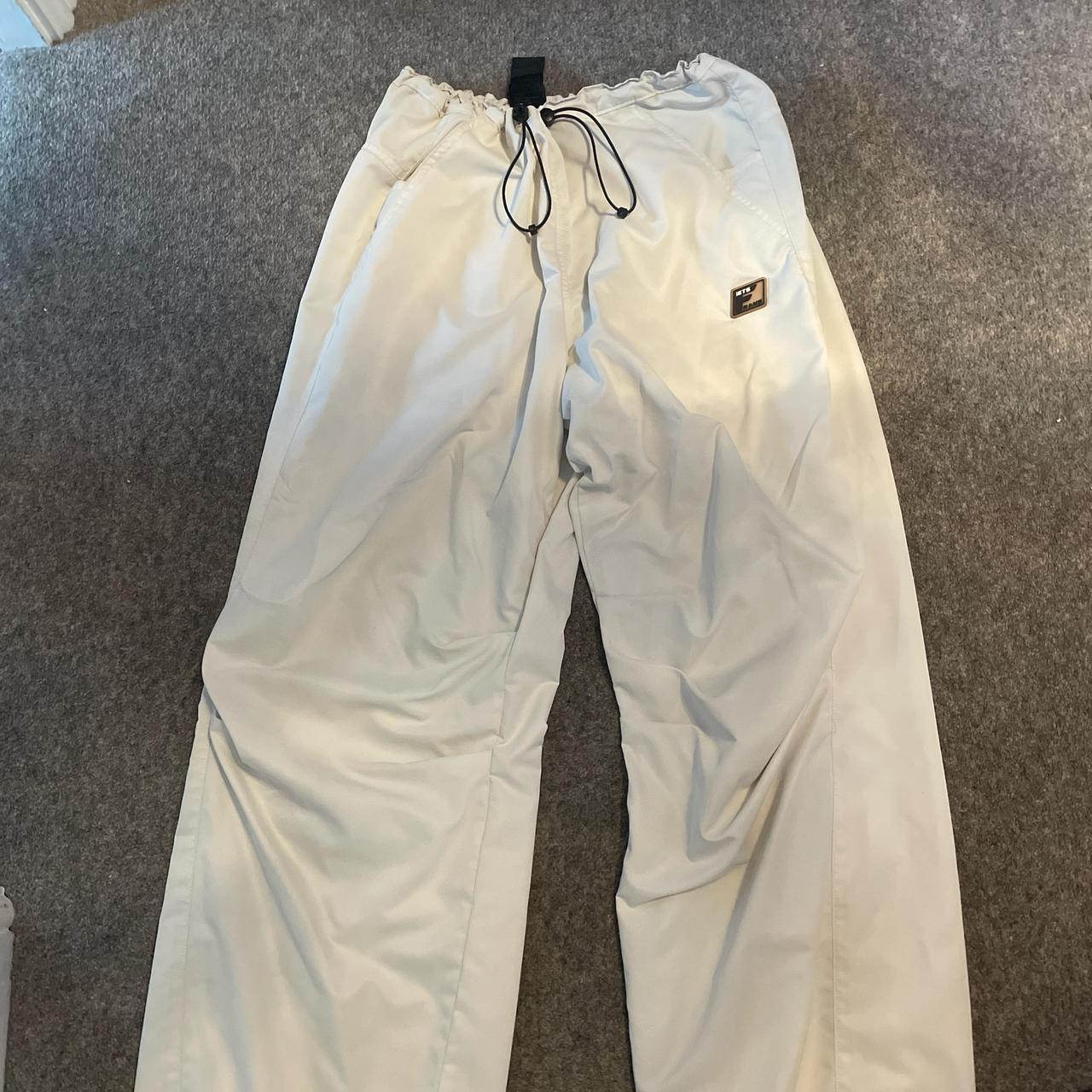 white drawstring parachute pants with iets frans... - Depop