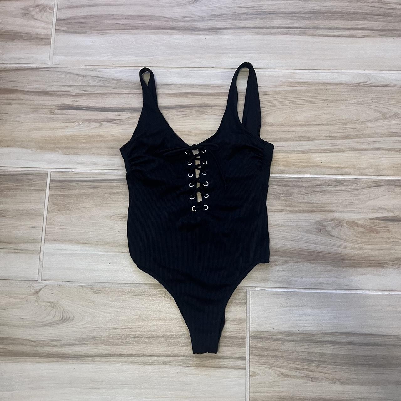 Black ribbed one piece swimsuit with adjustable tie... - Depop