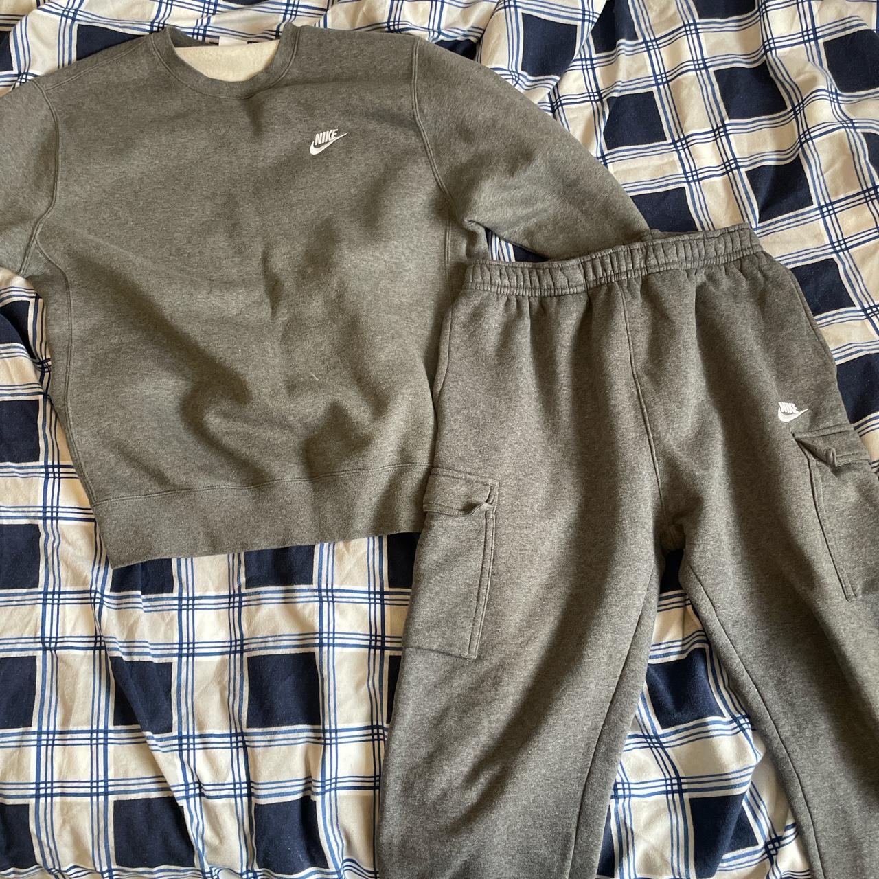 Men s plain grey Nike tracksuit been worn a couple. Depop