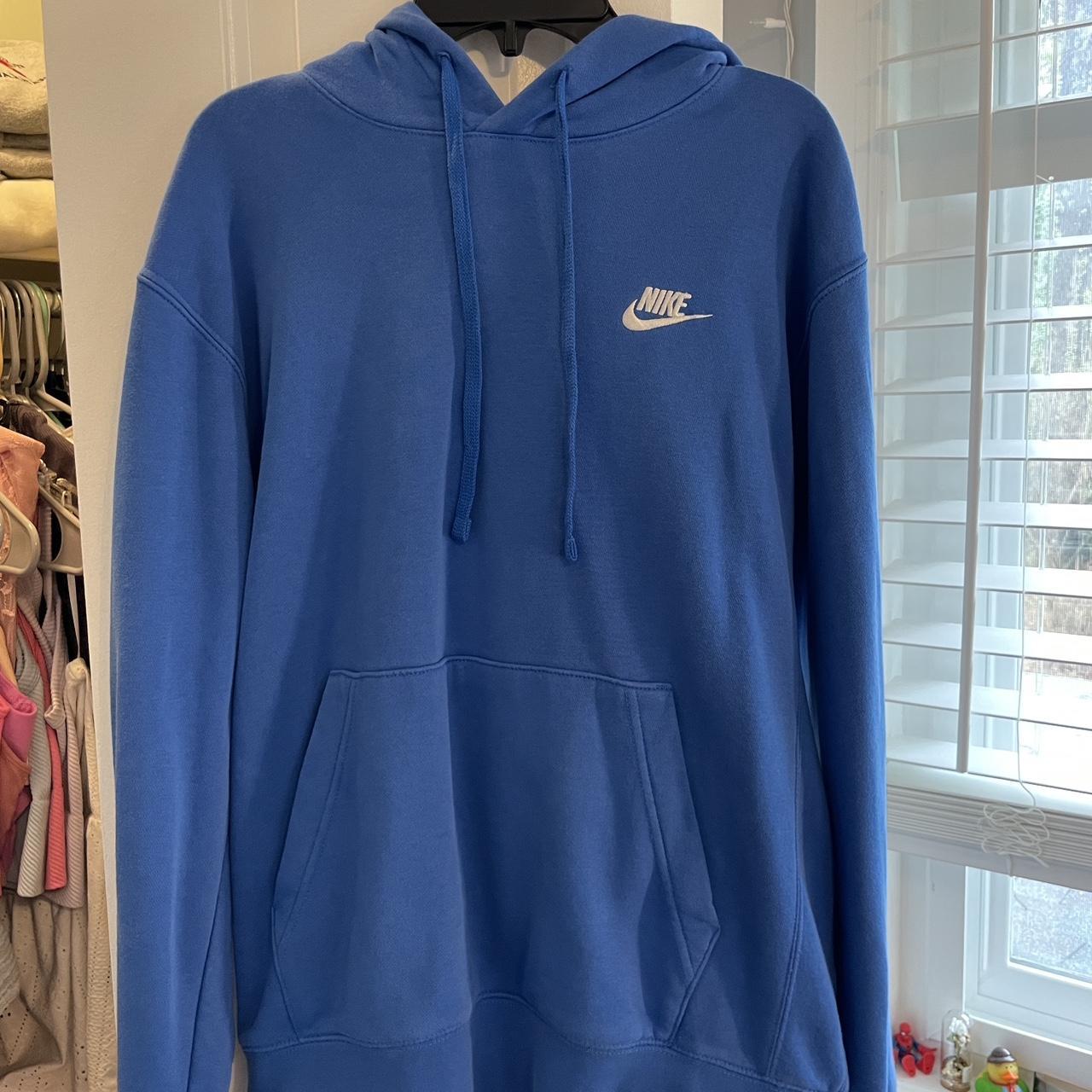 royal blue and gold nike shirt