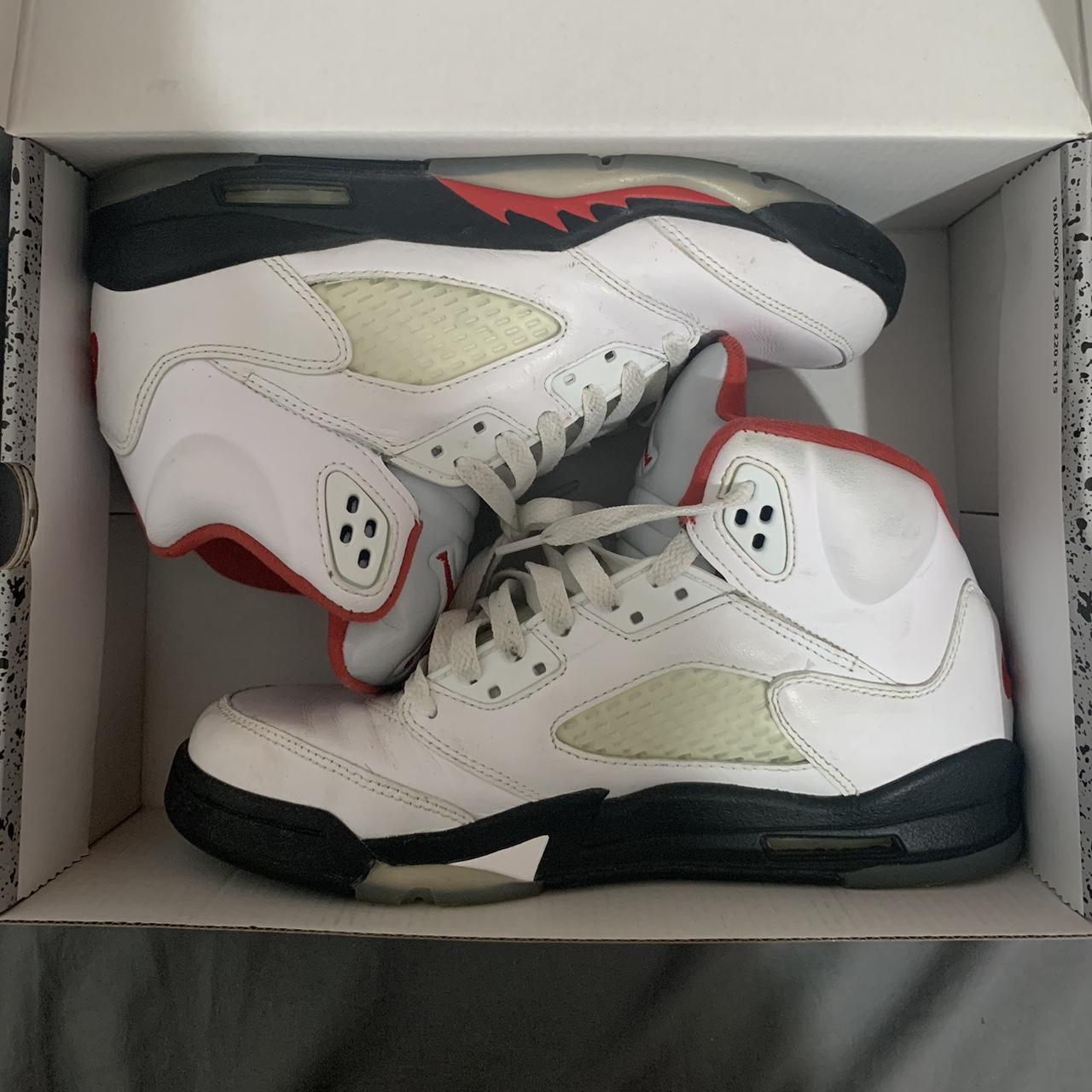 michael jordan wearing fire red 5s