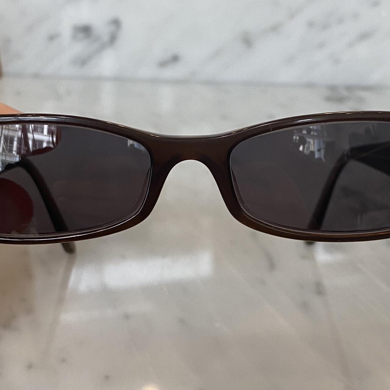 Chanel Women's Brown and Black Sunglasses Depop