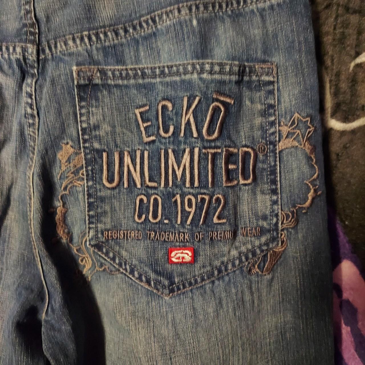 ecko unltd embroidered blue jeans. distressing on... Depop