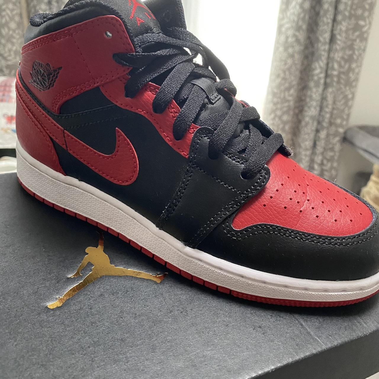 black & red jordan 11