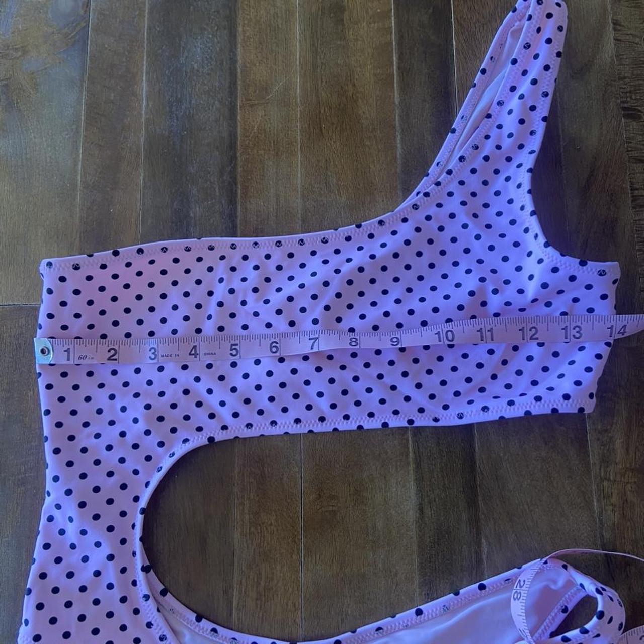 Baby pink one piece with black polkadots THE BRAND... Depop