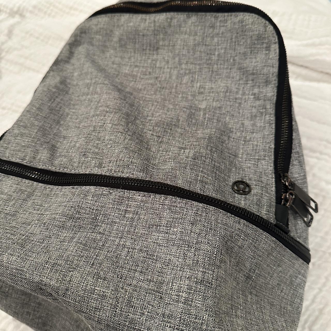 Lululemon grey and black backpack- in great... - Depop