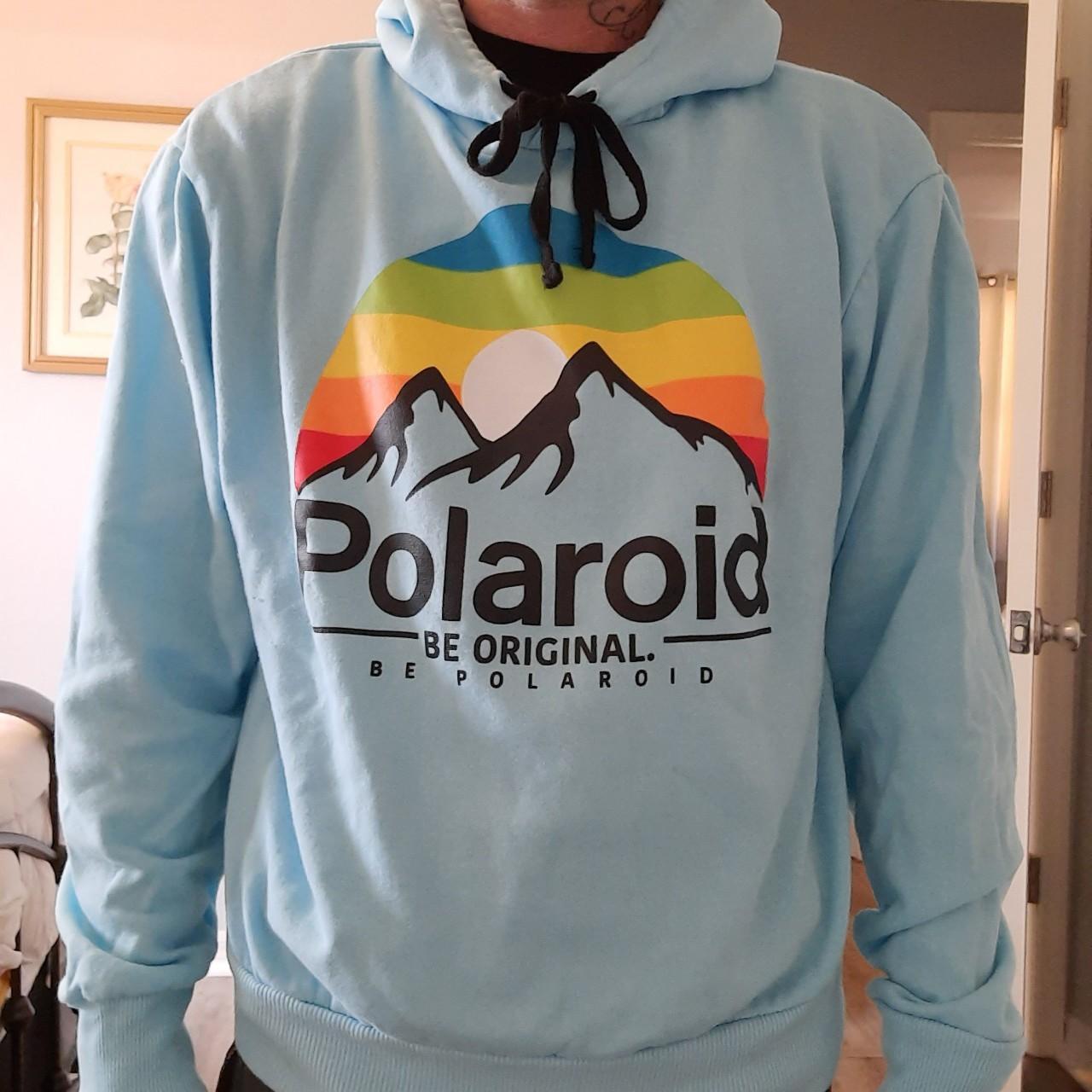 Polaroid hoodie. The tag says xl. Fits more like an. Depop