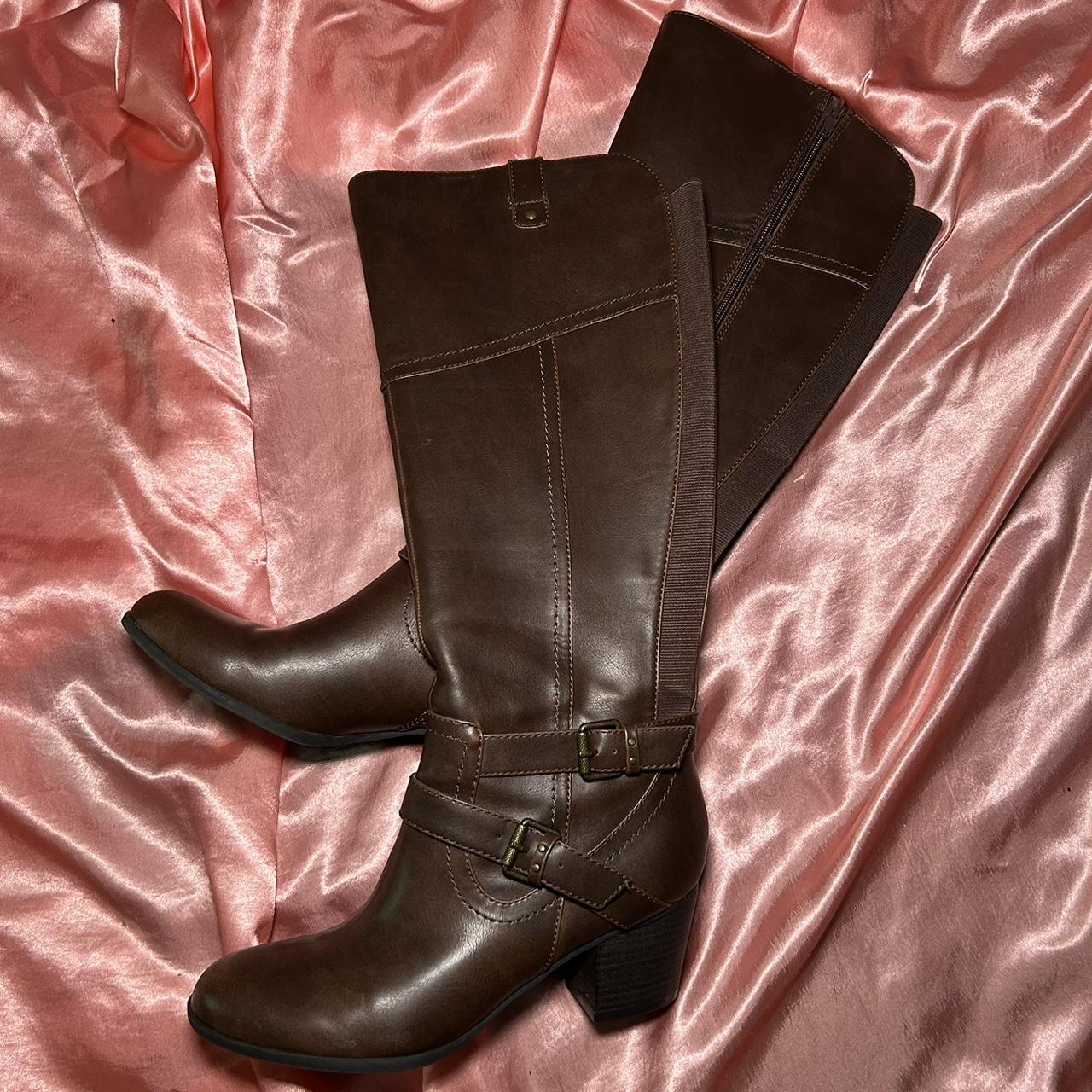 Brown knee high boots with zip up and buckle details... Depop